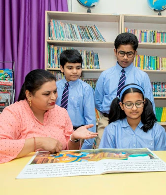 students engaged in integrated english learning at podar education school